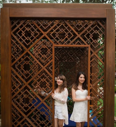 Janice family standing at the tropical villa entrance during a family photography session at Indigo Seminyak Bali