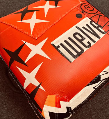 Handmade ottoman made from up cycled kite wing material