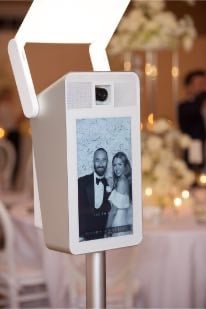 Couple posing in photo booth at Bakersfield wedding