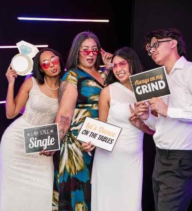 Vogue LED photo booth setup with neon lights at Sweet 16 party