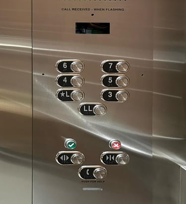 elevator control panel with floor buttons