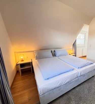Hotel DunenNest - Kleines Suite, Schlafzimmer, Boxspringbett