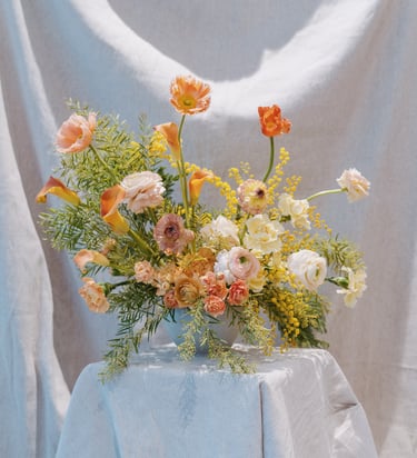composition de buffet dégradé de jaune et orange. Workshop Désirée Fleurs