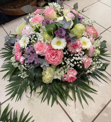 Deuil coussin rond par Artisan Fleuriste Ergué-Gabéric proche de Quimper