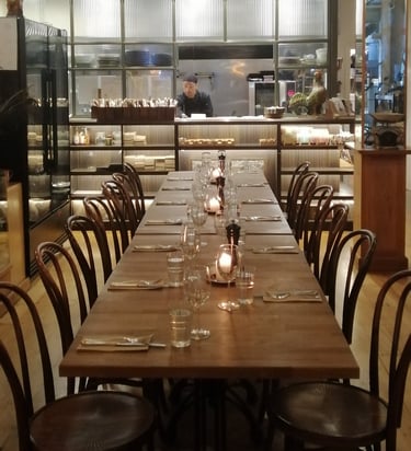 a long table with candles and candles on it