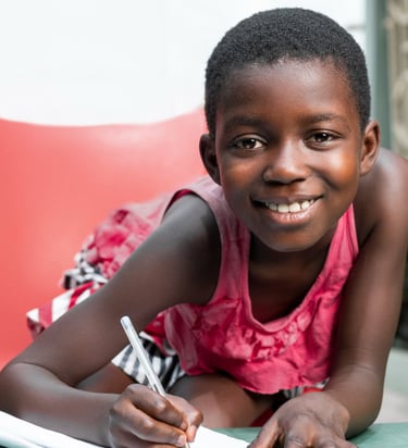 A child is enjoying writing