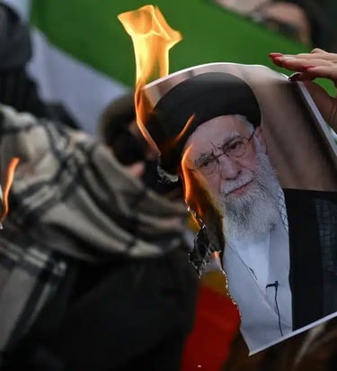 photograph of the Supreme Leader Khamenei being burned