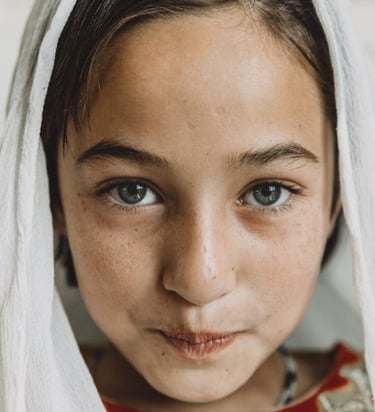 blue eye afghani girl look at you