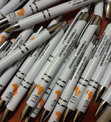 a bunch of pens and pens on a table