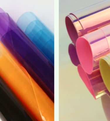 Rolls of clear and colorful PVC, EVA, and TPU materials, waterproof and modern.