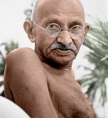 Mahatma Gandhi, simbolo del cambiamento, con la citazione "Sii il cambiamento che vuoi vedere nel mo