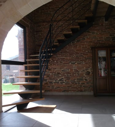 Escalier interieur limon central a Bessieres