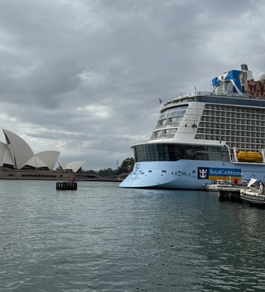 Royal Caribbean Quantum of the Seas docked in Sydney with Sydney Opera House in the background