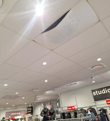 Lonehill Shopping Center roof leak damage