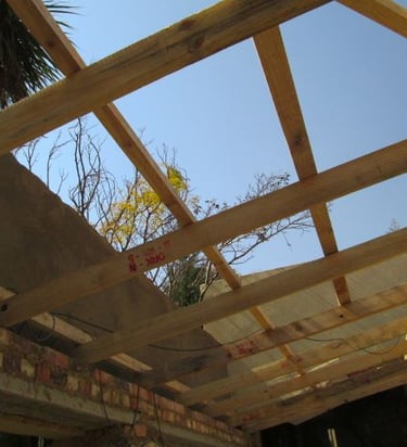 Construction of new roof structure after removal of damaged structure Krugersdorp Environmental Pro Construction