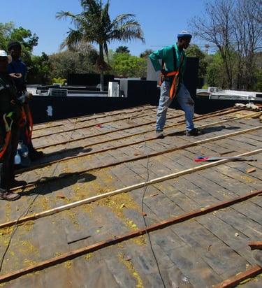 Roof stripping for roof replacent project in Hyde Park, Sandton, Environmental Pro Construction
