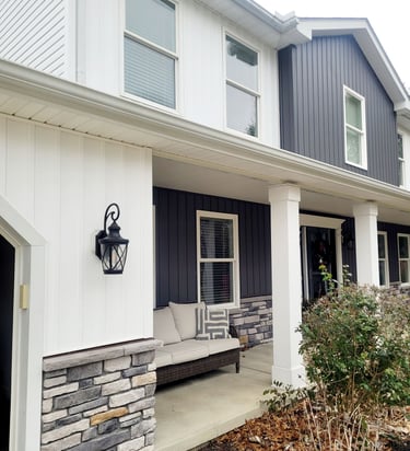 New white and gray vertical siding