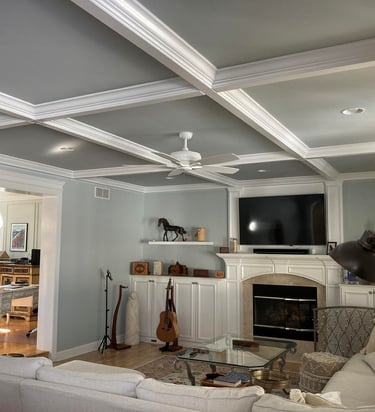 White coffered ceiling with gray inset panels installed in a Monmouth County living room