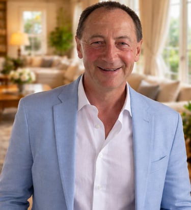 Stephen Williamson standing in a hotel lounge.