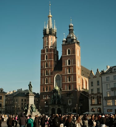 St. Mary’s Basilica and Main Market Square in Krakow, Poland with historic architecture