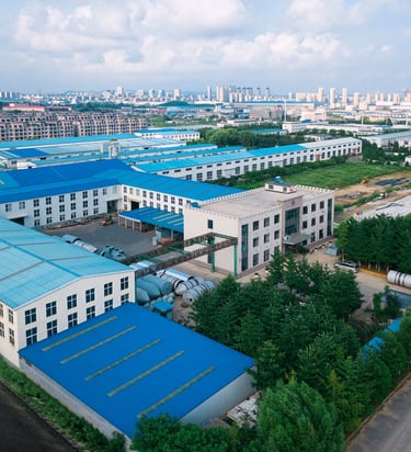 a large building with a blue roof and a blue roof