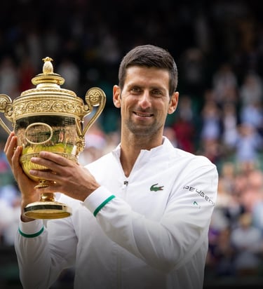 Novak Djokovic with Wimbledon trophy - a seven-time Wimbledon champion
