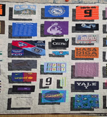 Custom T-shirt quilt made from multiple shirts