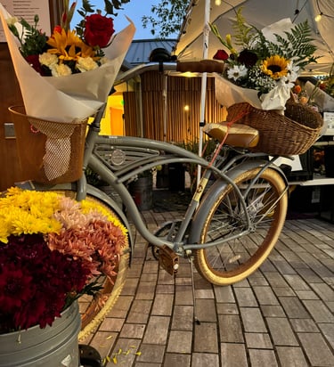 hand-created flower bouquets staged on a bike for a chic bohemian vibe