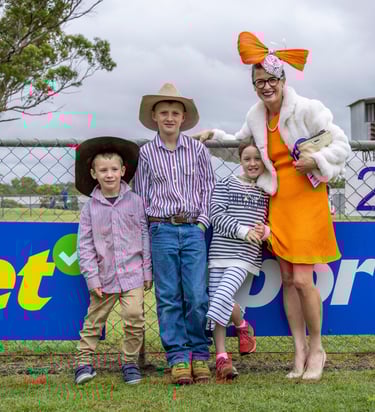 Family enjoying the races
