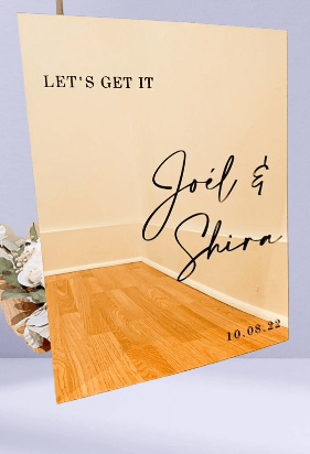 Chic gold acrylic wedding sign for Joël & Shira with date.