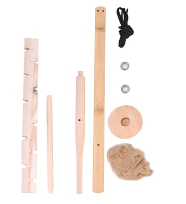 Bow drill fire starter kit with spindle, bow, fireboard, and tinder.