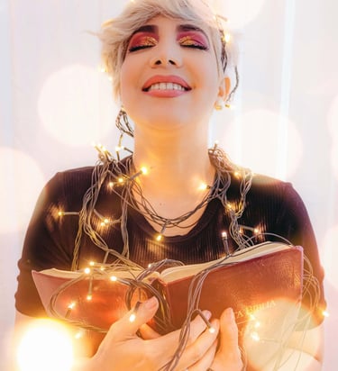 a woman with blonde hair and a book