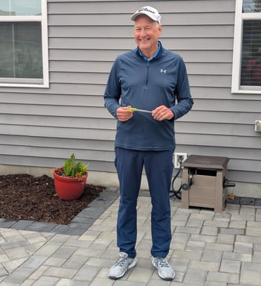 Jeff Paniati presenting the Mini-Guinea Trophy to himself for defending his title.