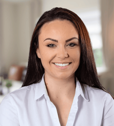 a woman with a smile on her face