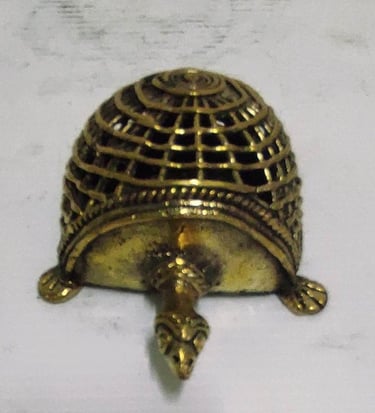 "Handcrafted brass tortoise with mesh-style carving on back–top view-for global shipment"