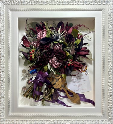 a side view preserved wedding bouquet with a Welsh wedding spoon