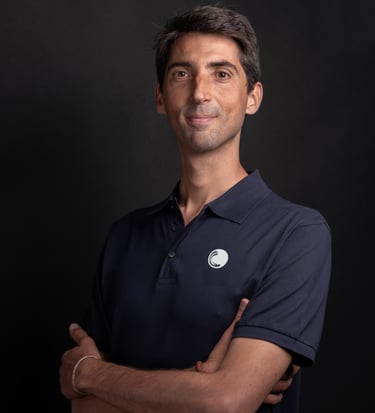 a man in a blue shirt and a white shirt
