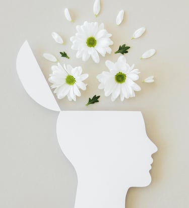 a white head with flowers in a white headpiece
