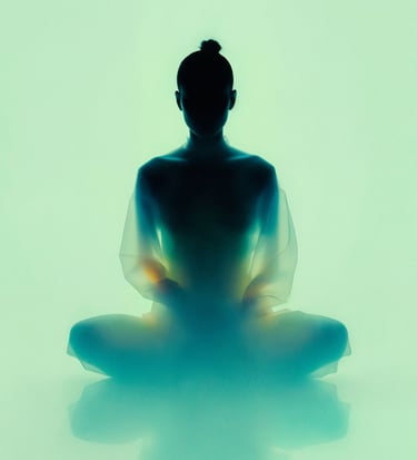 a woman sitting in a meditation position