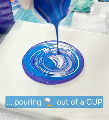 pictureup acrylic pouring out of a cup