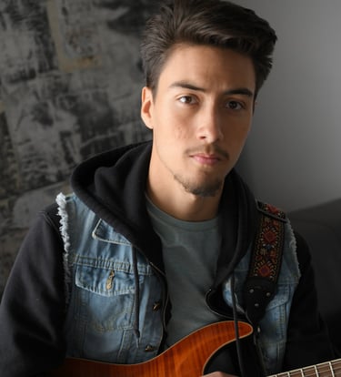 Me holding my ESP Rock Scholarship guitar.