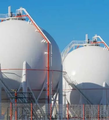a row of white Gases tanks 