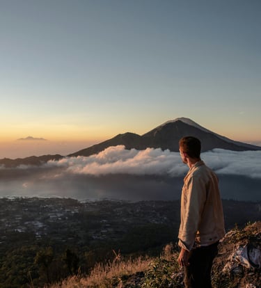 Photo by Chris Economou: https://www.pexels.com/photo/a-man-standing-on-the-mountain-summit-6367325/
