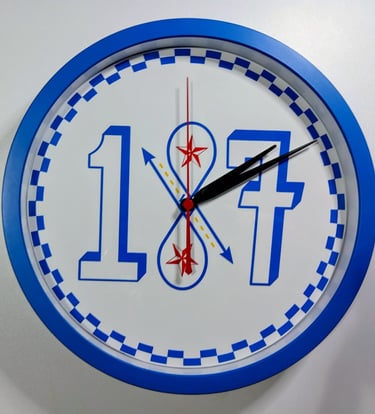 A blue and white round wall clock featuring large numbers 1 and 7 with a decorative red star design.