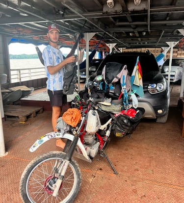 a man standing next to a motorcycle in a garage