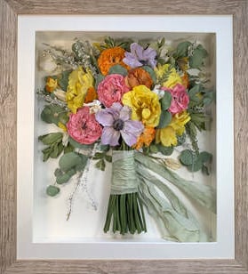 a side view preserved wedding bouquet in a frame