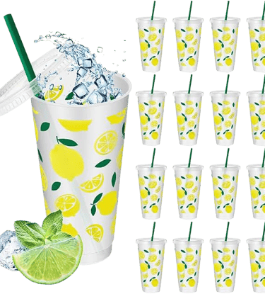 Set of 16 reusable plastic lemon print cold cups with lids and green straws for iced drinks.