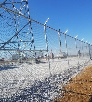 Commercial chain link fence with barbed wire installed for business security in Kentucky