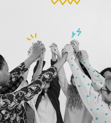 a group of people holding hands in a circle