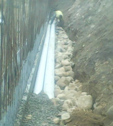 Pipes being laid out for sewerage system
